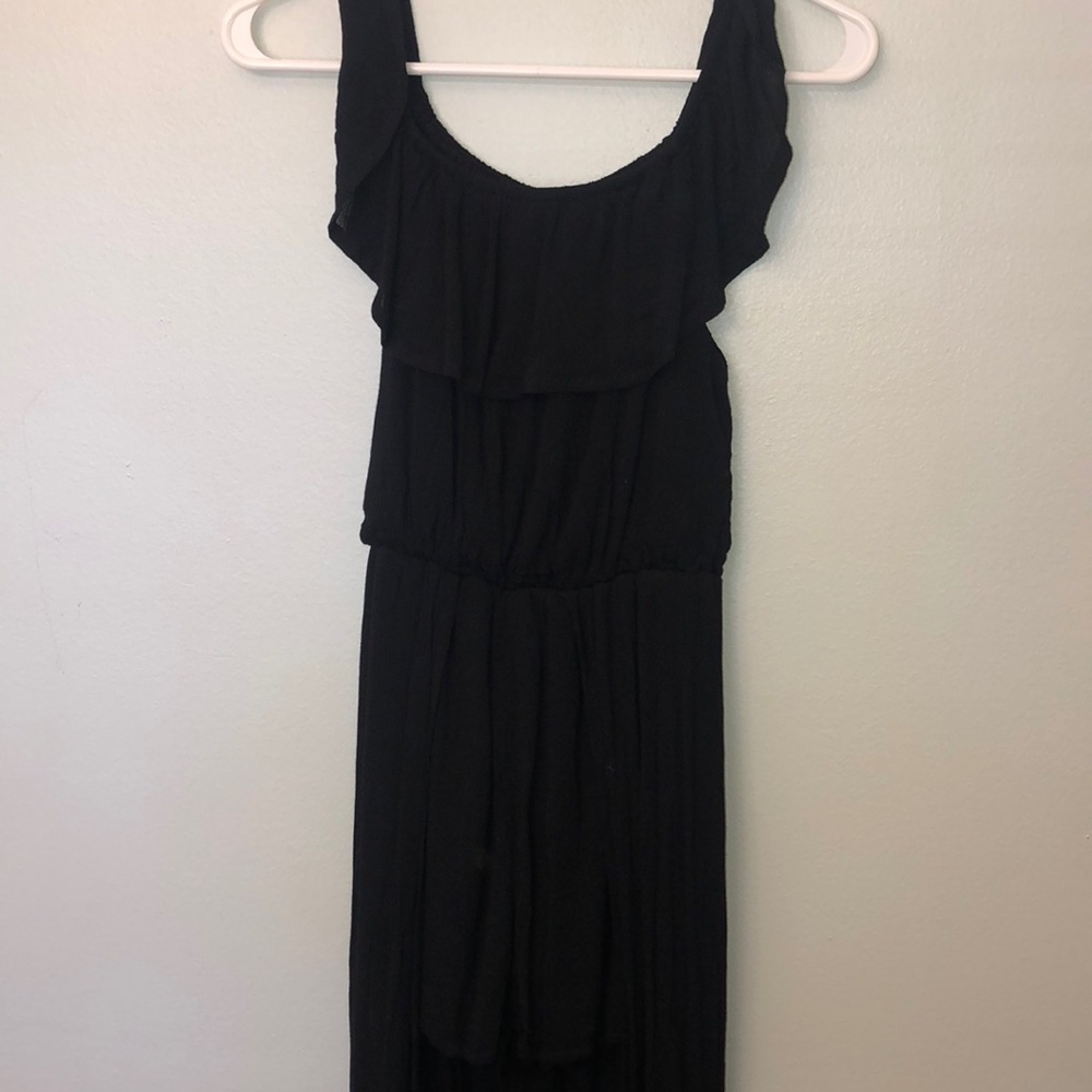Black romper. Shorts underneath.